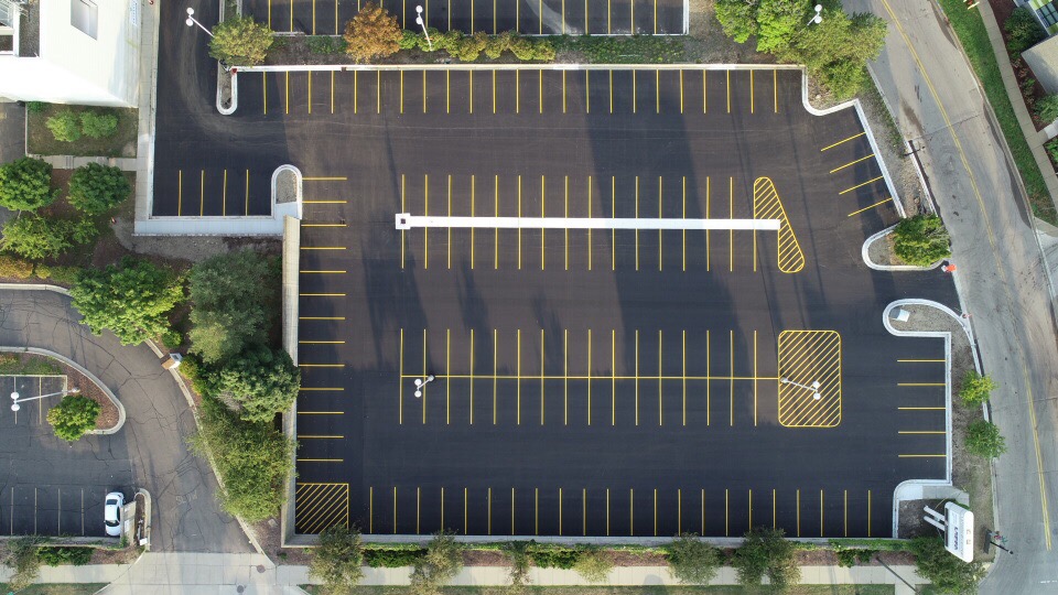 Aerial view of freshly striped commercial parking lot