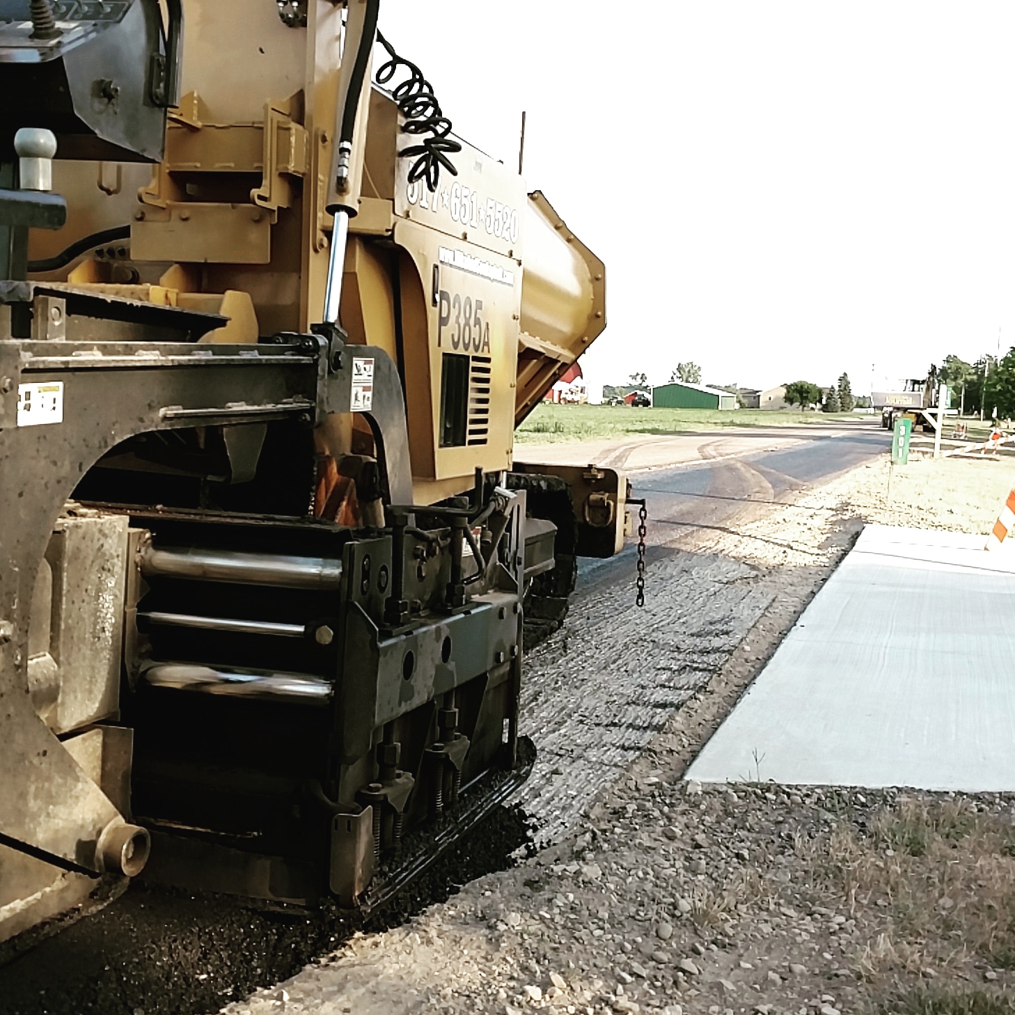 Close-up of LeeBoy P385A paver laying asphalt
