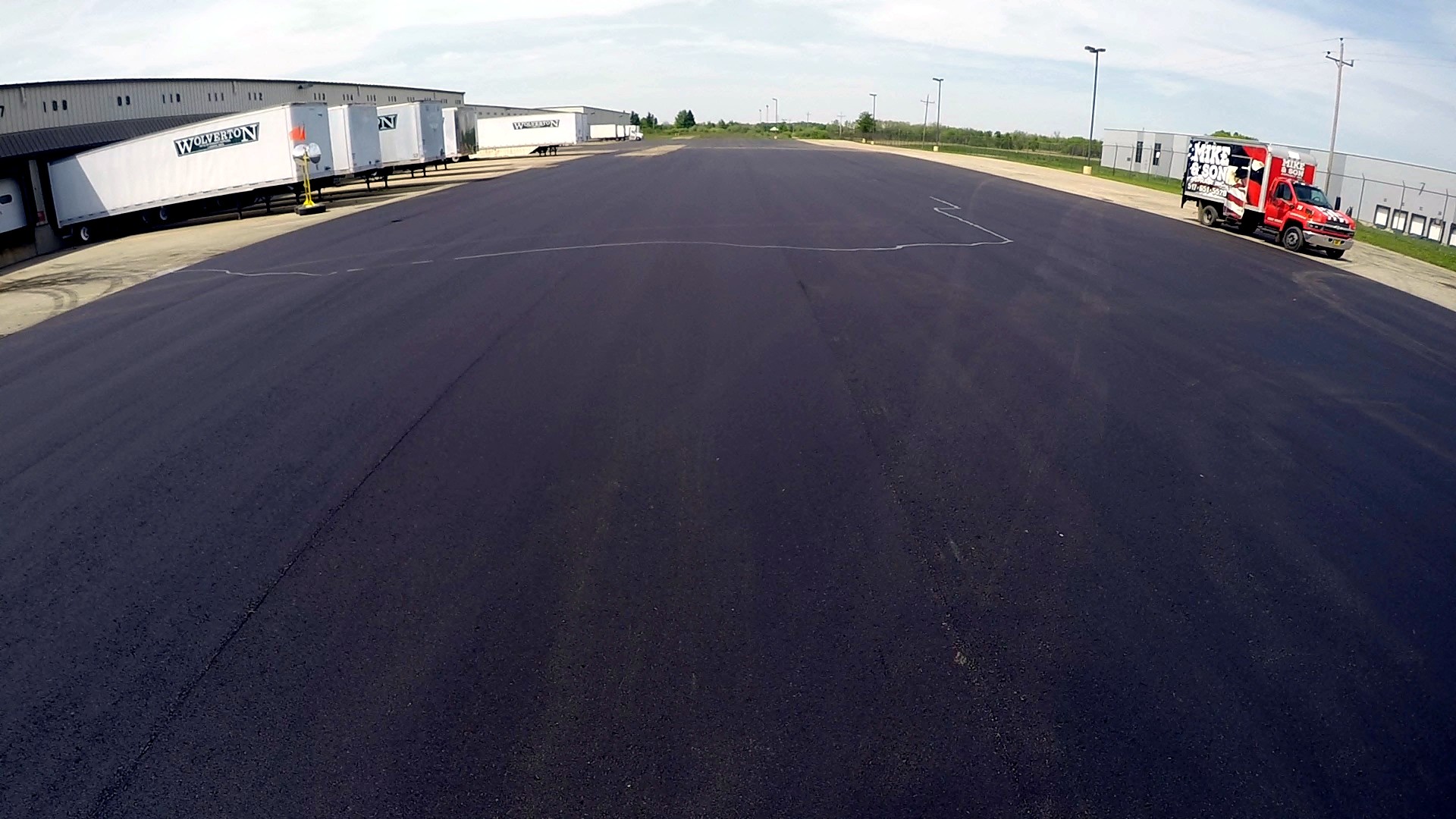 Aerial commercial lot with Spartan trailers and industrial docks