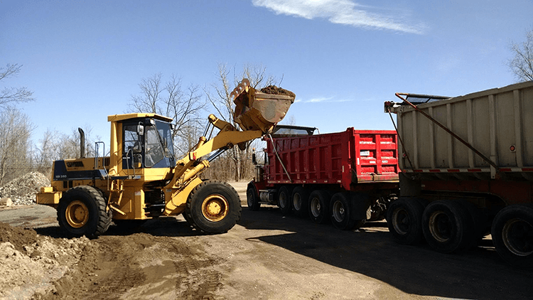 Mike & Son asphalt equipment on a job site